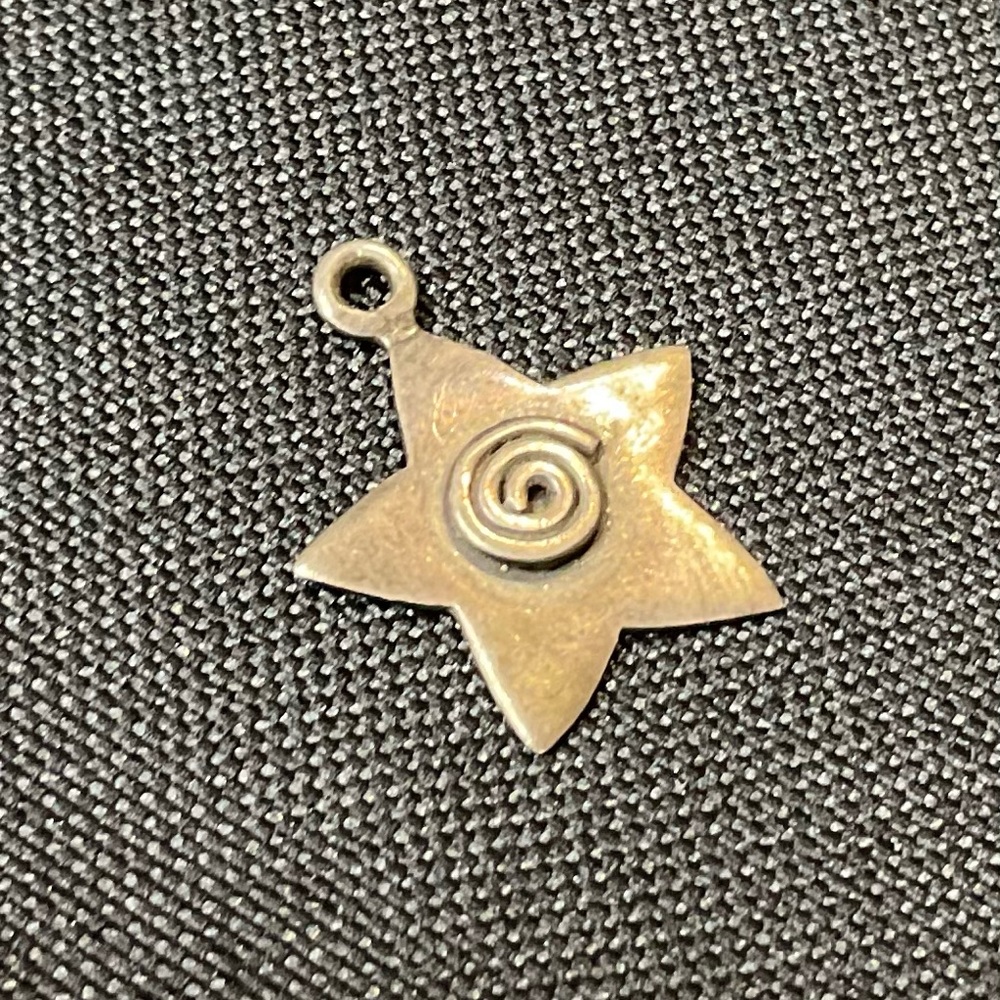 Bronze Star Pendant with Spiral Design